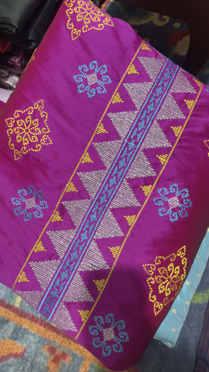 kain tenun motif tolaki