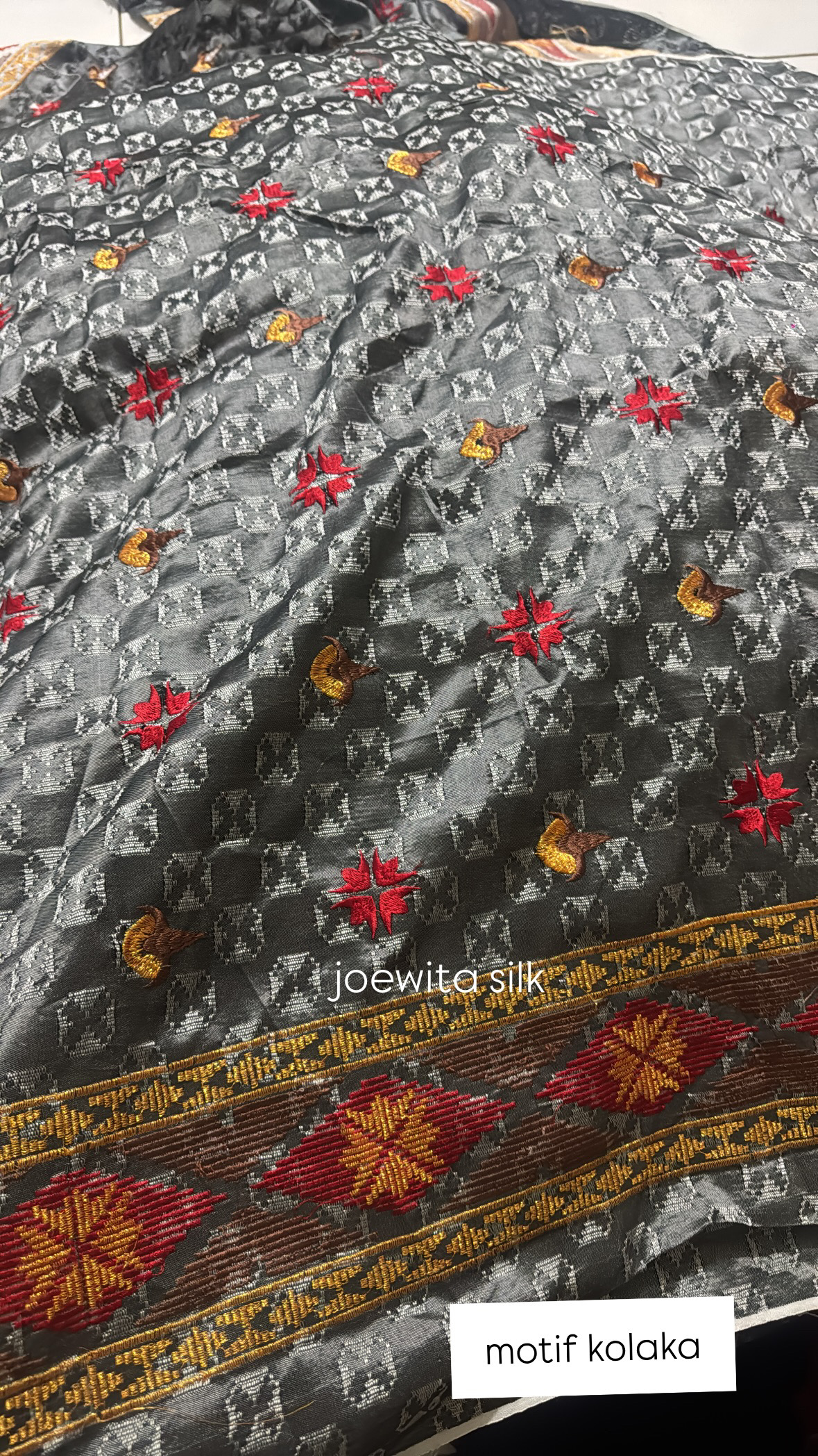 kain tenin motif kolaka